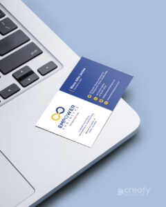 Creative business card placed on a laptop